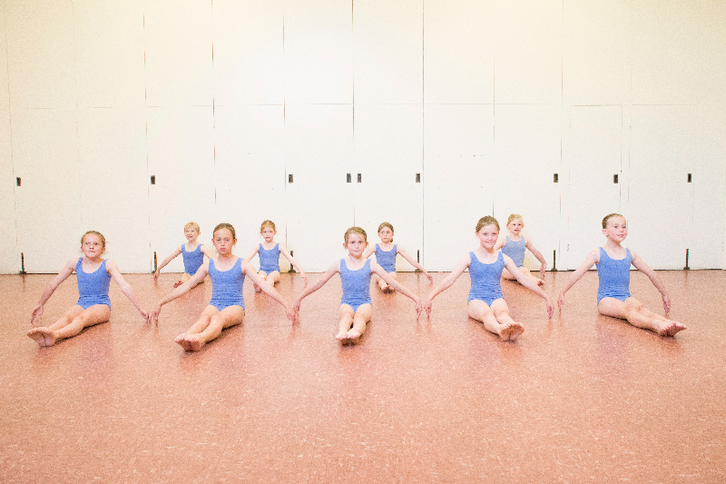 modern dance girls sitting on the floor